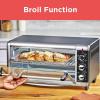 imageBLACKDECKER 8Slice Extra Wide Convection Toaster Oven Fits 9quotx13quot Oven Pans and 12quot Pizza Bake Toast Broil and Keep Warm Functions Countertop Compact Design with Stainless Steel Finish
